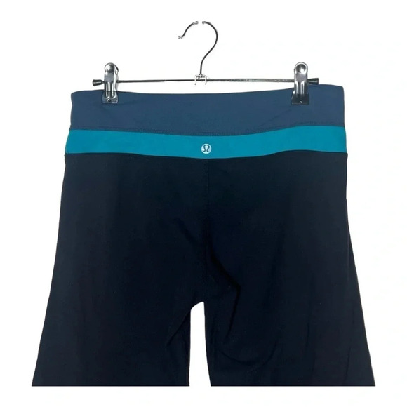 1938. LULULEMON GROOVE CROP LEGGINGS BLACK/NAVY BLUE/TEAL COLOR SEE MEASUREMENTS - Picture 5 of 7